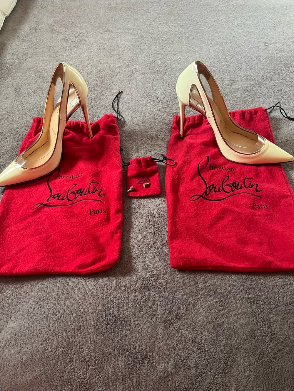 Christian Louboutin White
Patent Leather Pointed Pumps
